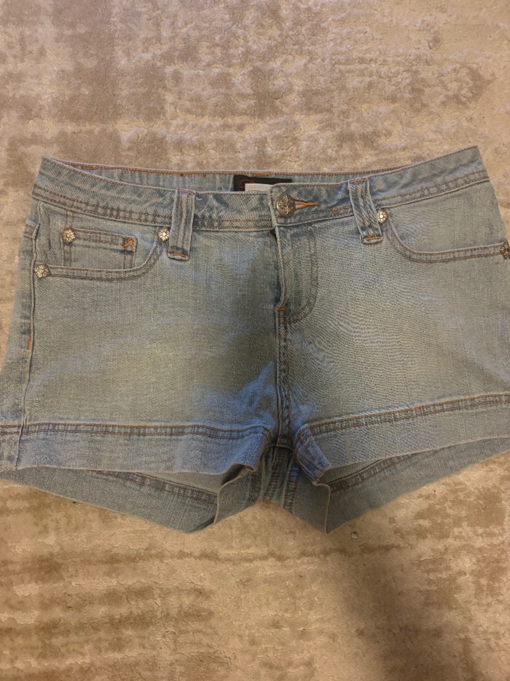 micro shorts with rainbow bedazzled pockets